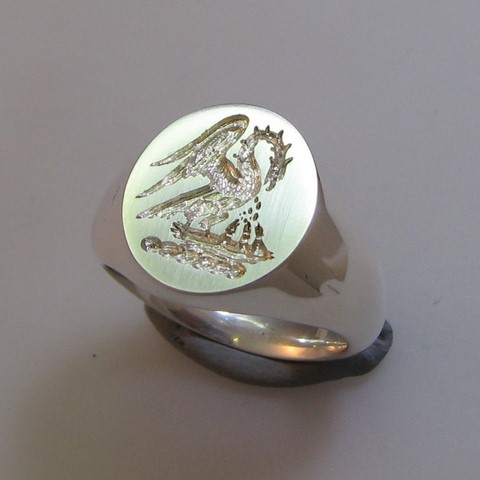 Pelican crest engraved signet ring